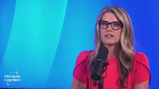 a woman giving an explanation with a video giving a presentation