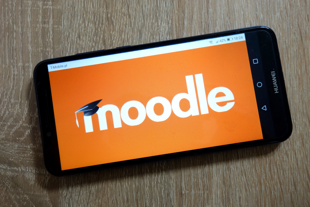 Smartphone displaying the Moodle app, a valuable tool for enhancing business research service capabilities.